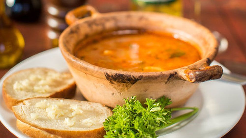 Zuppa di moscardini con tortino affogato ai porri